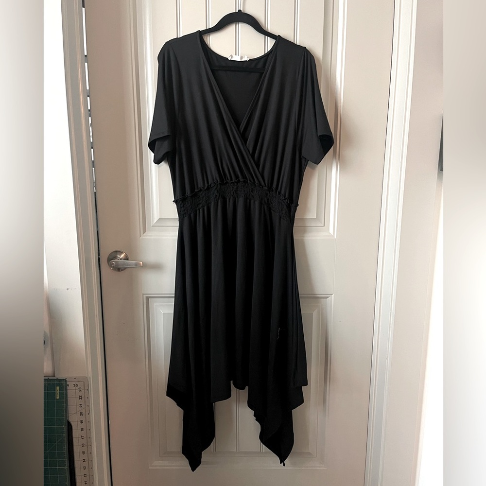 Handkerchief hem surplice neckline black midi dress Vine & Love